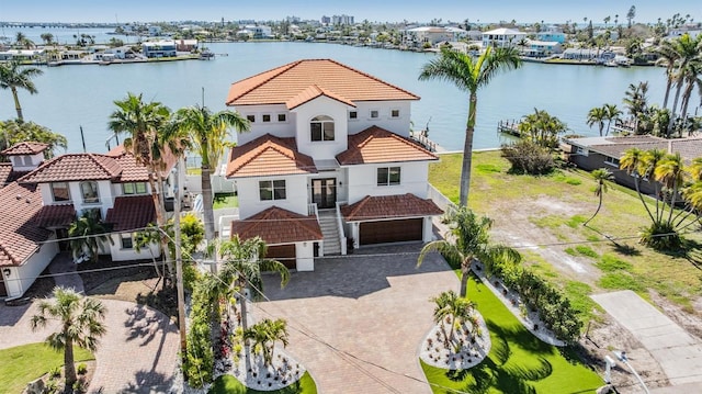 aerial view with a water view and a residential view