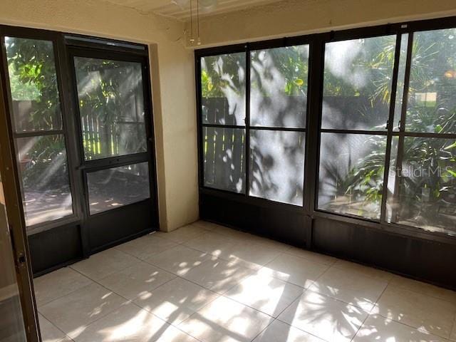 view of unfurnished sunroom