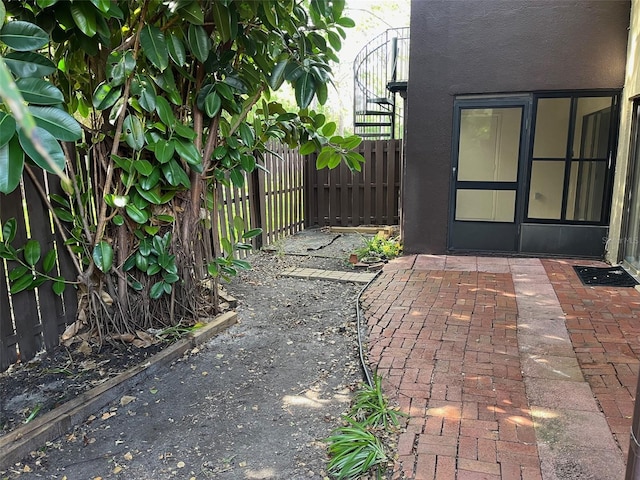 view of patio / terrace featuring fence