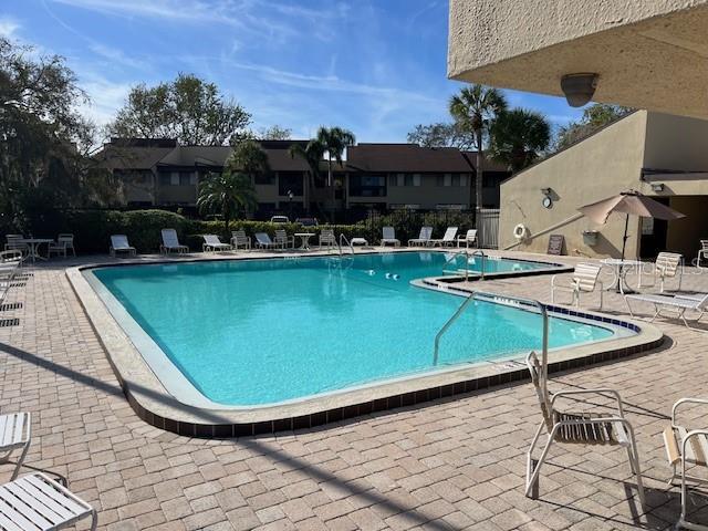 pool featuring a patio area