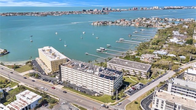 aerial view featuring a city view and a water view