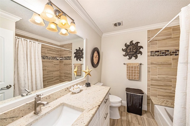 full bathroom with visible vents, toilet, ornamental molding, and a textured ceiling