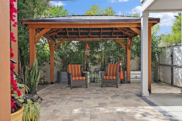 view of patio with a gazebo and a fenced backyard