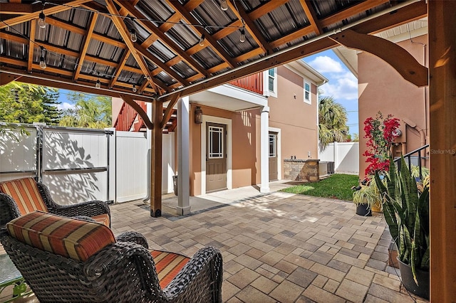 view of patio / terrace featuring a gazebo and a fenced backyard