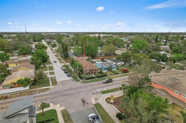 birds eye view of property with a residential view