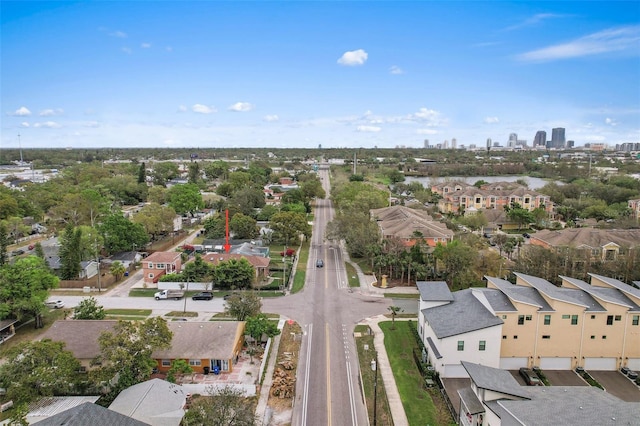 birds eye view of property with a residential view