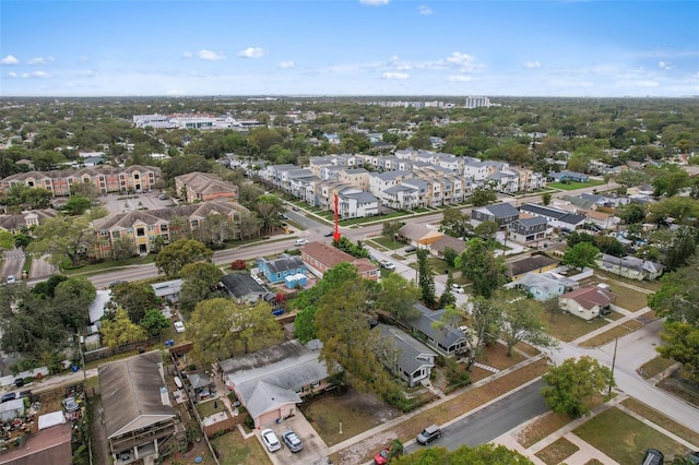 birds eye view of property with a residential view