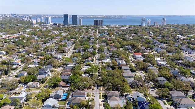 bird's eye view with a water view and a residential view