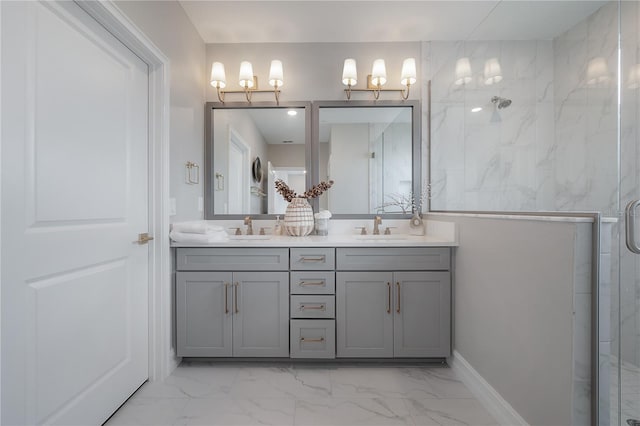 bathroom featuring a sink, a marble finish shower, and marble finish floor