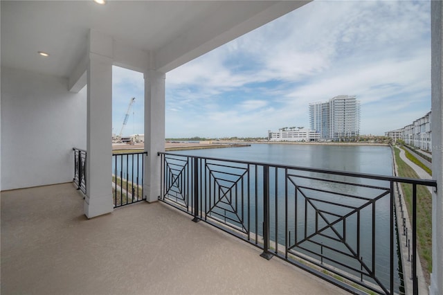 balcony with a city view and a water view