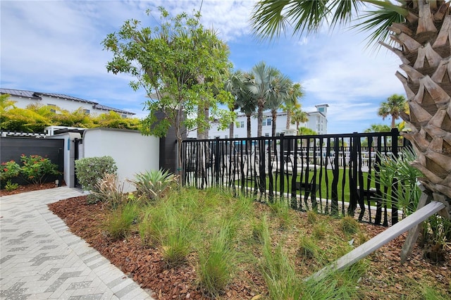 view of yard featuring a gate and fence