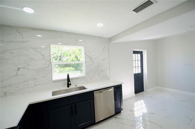 kitchen with visible vents, plenty of natural light, dishwasher, and a sink