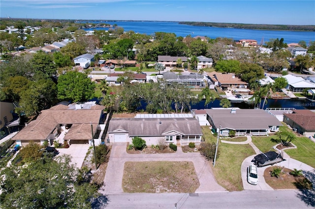 aerial view featuring a residential view and a water view