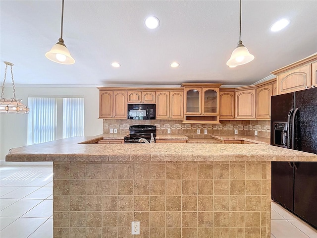 kitchen with backsplash, a center island with sink, light countertops, light tile patterned floors, and black appliances