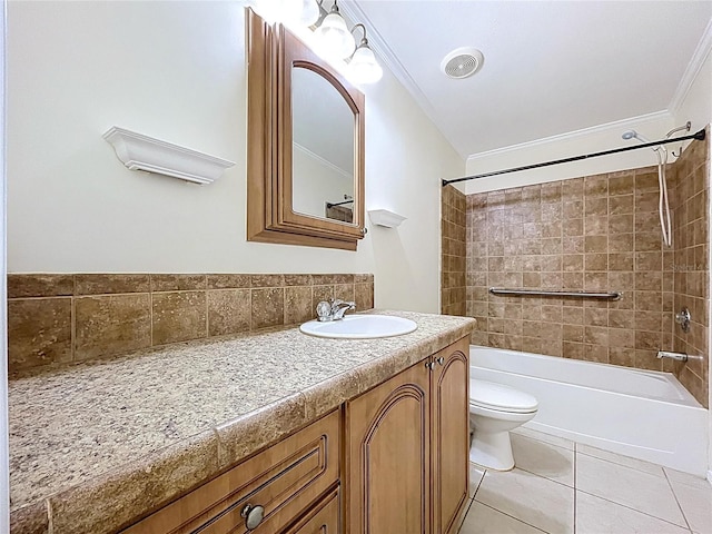 bathroom featuring tile patterned flooring, crown molding, washtub / shower combination, toilet, and vanity