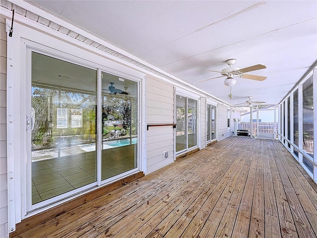 deck featuring a ceiling fan