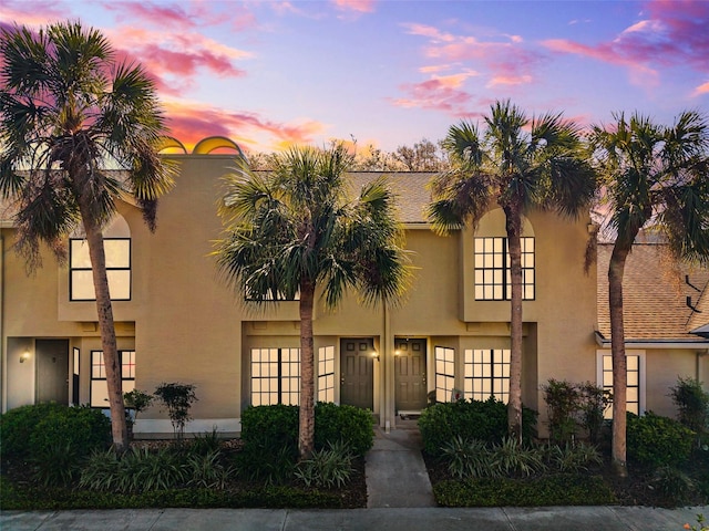 view of front of home featuring stucco siding