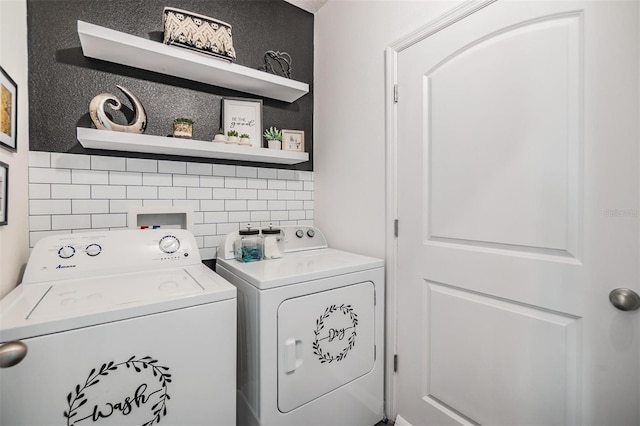 laundry area featuring laundry area and washer and dryer