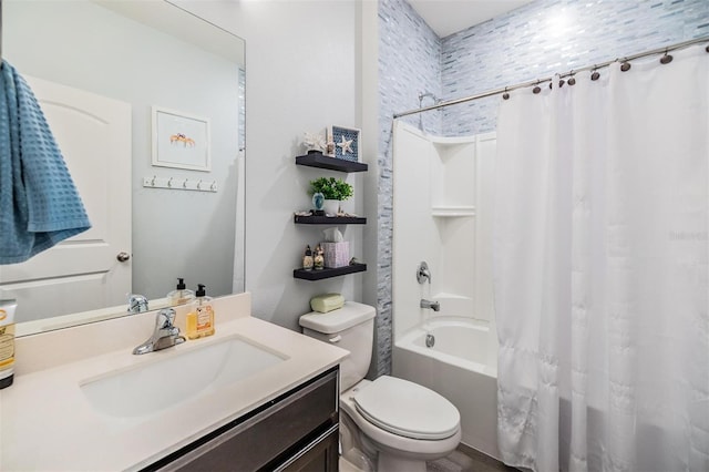 full bath with vanity, toilet, and shower / tub combo