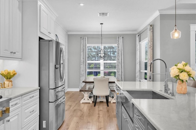 kitchen featuring light wood finished floors, white cabinets, crown molding, and stainless steel refrigerator with ice dispenser