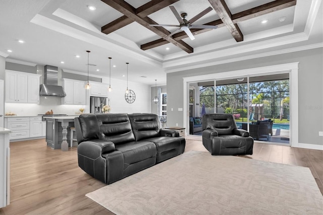 living room featuring beamed ceiling, coffered ceiling, baseboards, and light wood-style floors