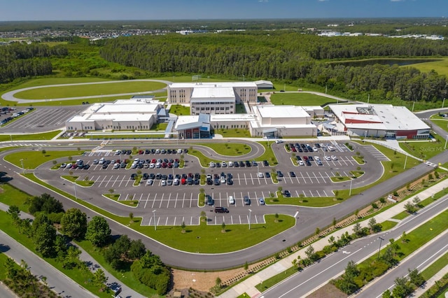 aerial view with a wooded view