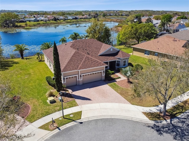 aerial view with a water view and a residential view