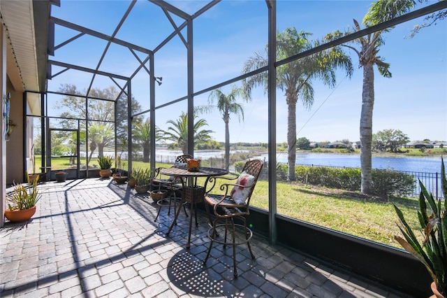 sunroom with a water view