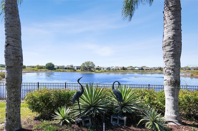 water view featuring fence