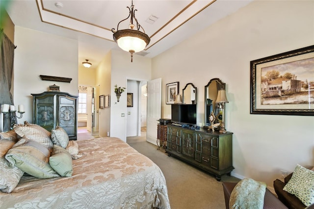 bedroom with carpet flooring, connected bathroom, baseboards, and visible vents