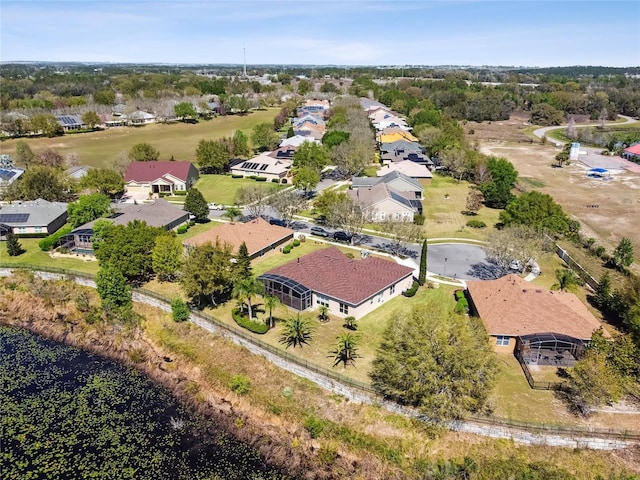 birds eye view of property with a residential view