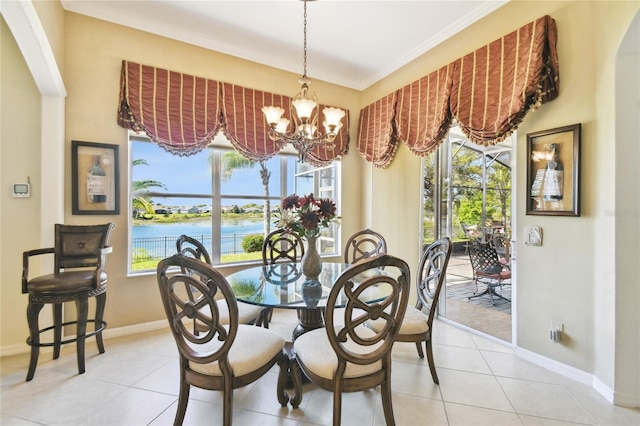 252 Bayou Bend Rd, Groveland, FL 34736 - dining area featuring an inviting chandelier, light tile patterned floors, and a wealth of natural light