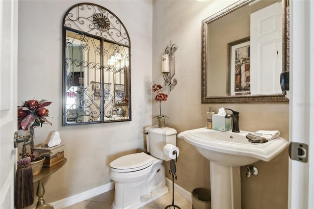 252 Bayou Bend Rd, Groveland, FL 34736 - bathroom featuring tile patterned flooring, toilet, and baseboards