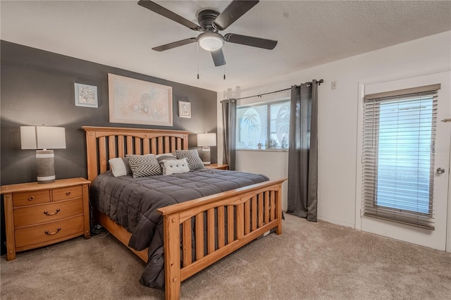 8325 112th St Unit 202, Seminole, FL 33772 - bedroom with a ceiling fan, carpet floors, and a textured ceiling