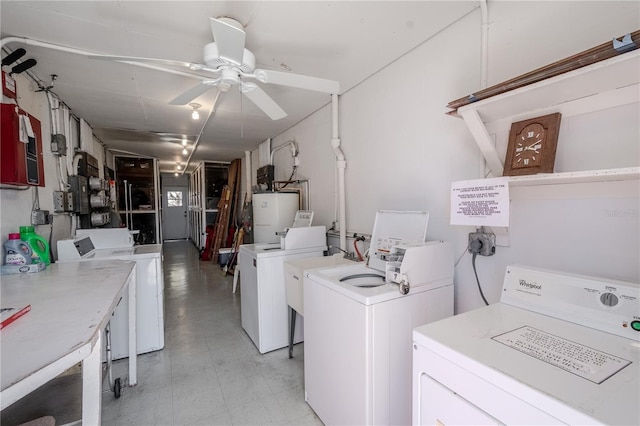 8325 112th St Unit 202, Seminole, FL 33772 - shared laundry area with washing machine and clothes dryer, water heater, and a ceiling fan