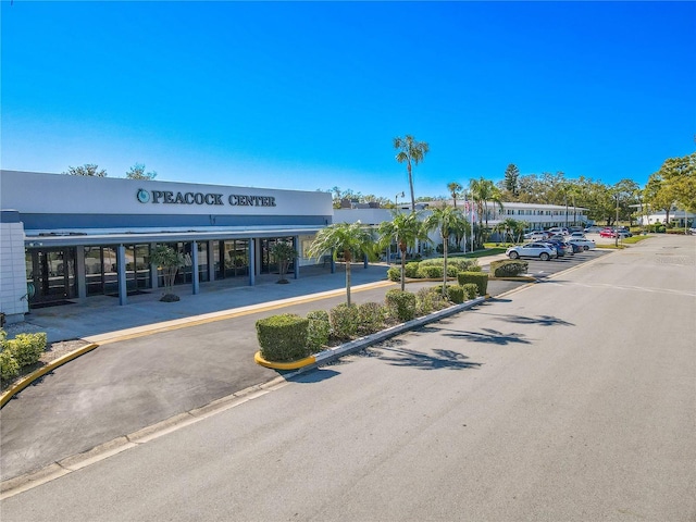 8325 112th St Unit 202, Seminole, FL 33772 - view of property featuring uncovered parking