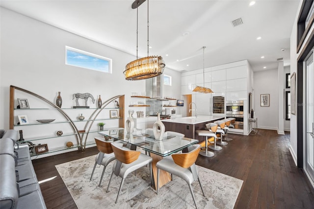 dining room with visible vents, recessed lighting, baseboards, and dark wood-style flooring