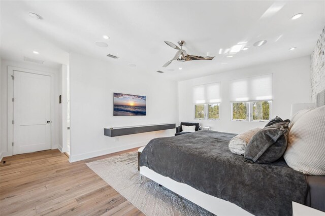 bedroom with visible vents, baseboards, recessed lighting, wood finished floors, and a ceiling fan