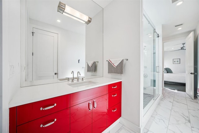 bathroom featuring recessed lighting, marble finish floor, ensuite bathroom, and a shower stall