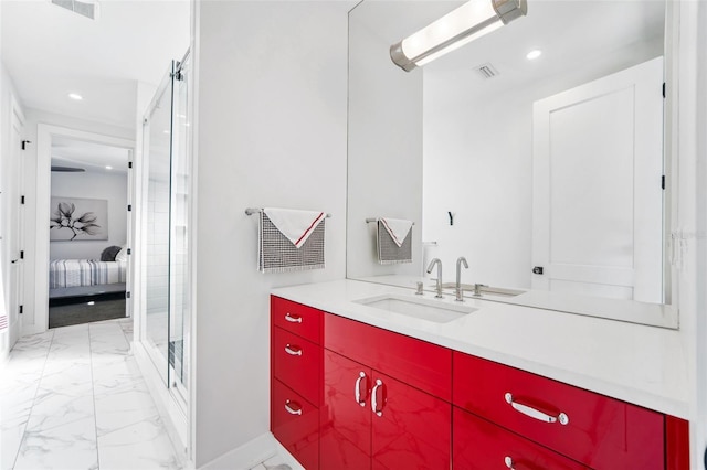 ensuite bathroom with visible vents, marble finish floor, a stall shower, connected bathroom, and vanity