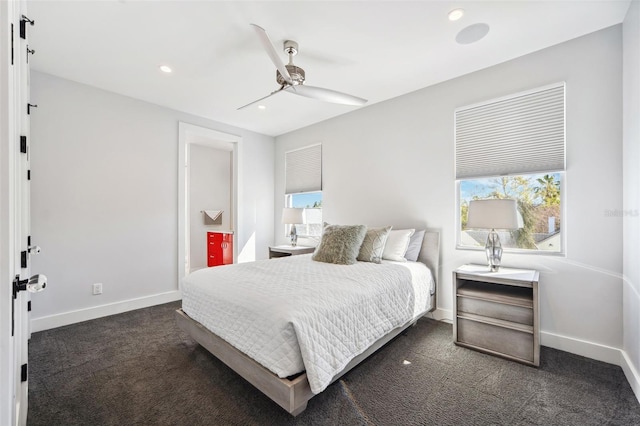 carpeted bedroom with a ceiling fan, recessed lighting, and baseboards