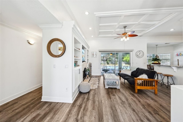 living room featuring baseboards, coffered ceiling, wood finished floors, and a ceiling fan