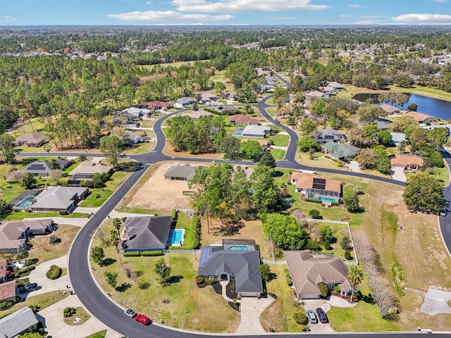 aerial view with a residential view and a water view