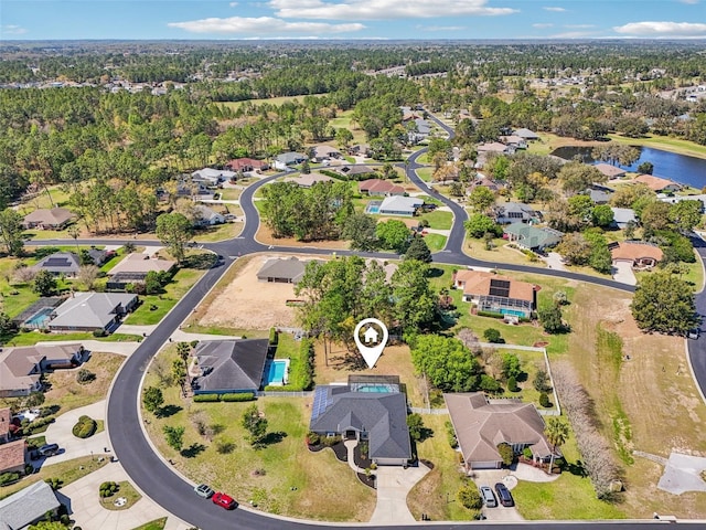 bird's eye view featuring a residential view and a water view