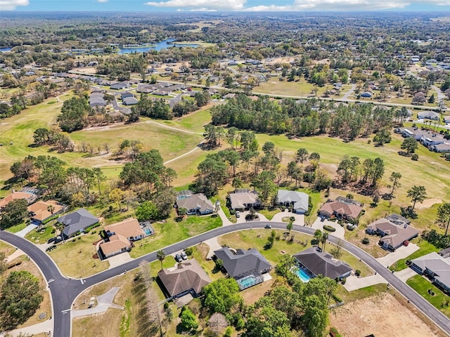 aerial view with a residential view and a water view