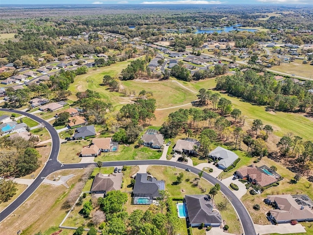 aerial view with a residential view and a water view