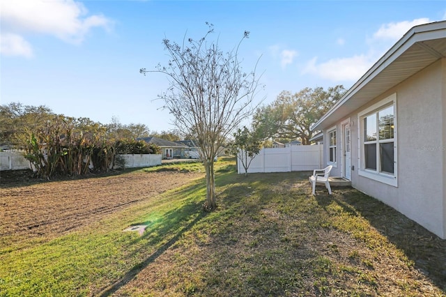 view of yard with fence