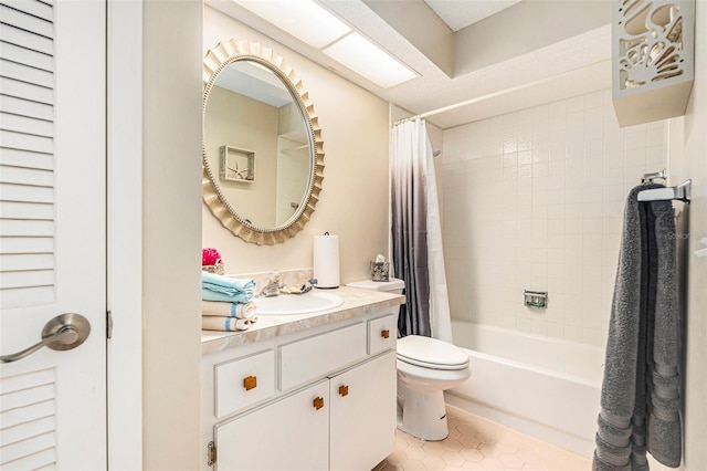 bathroom featuring vanity, tile patterned floors, toilet, and shower / bath combo with shower curtain