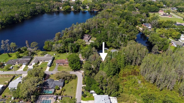 bird's eye view with a forest view, a water view, and a residential view