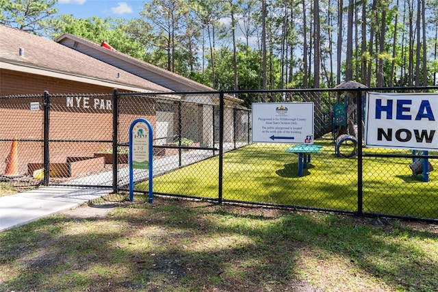 exterior space with a yard and fence